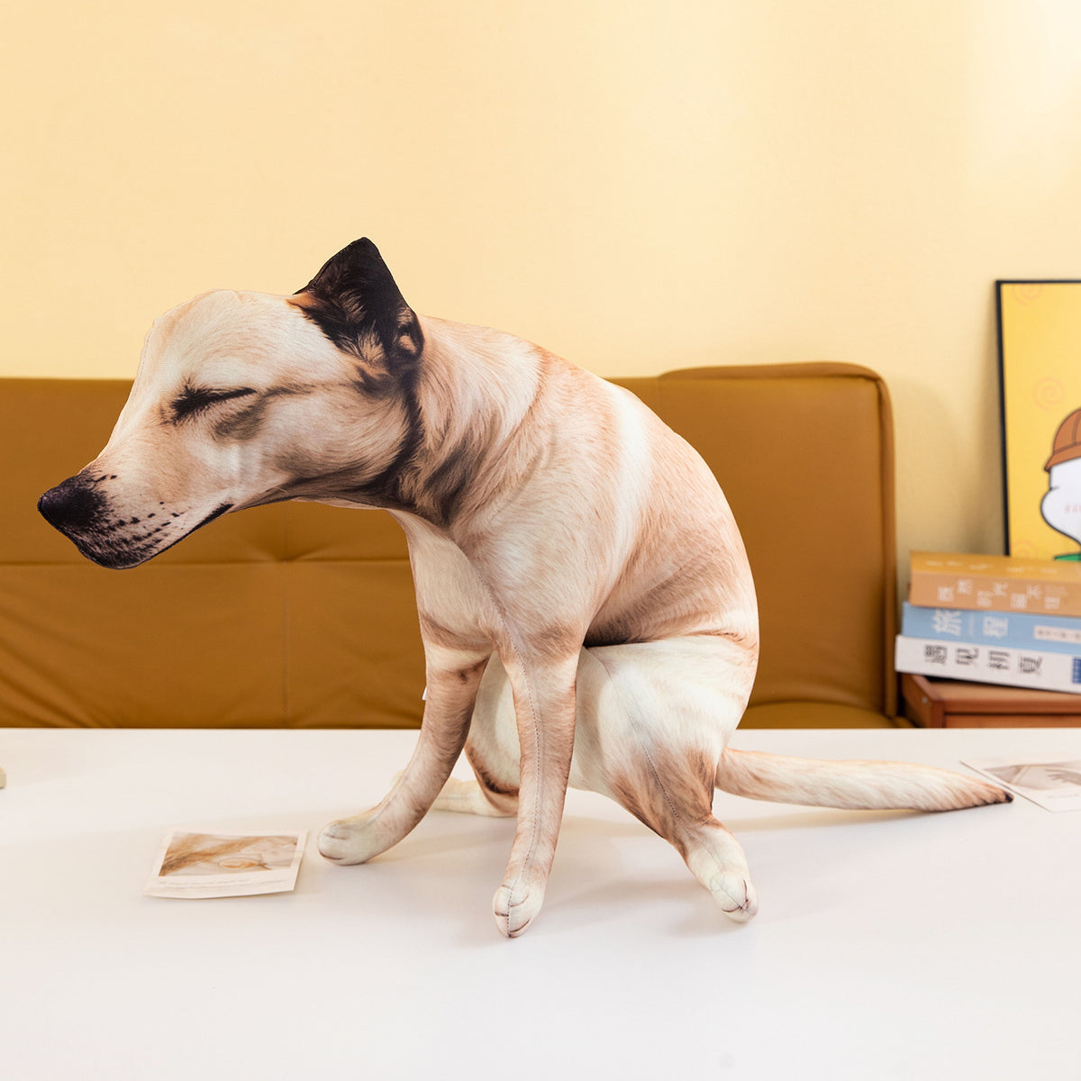 Squatting-dog plush ornament displayed on a table